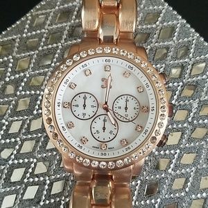 Rose gold large faced ladies watch
